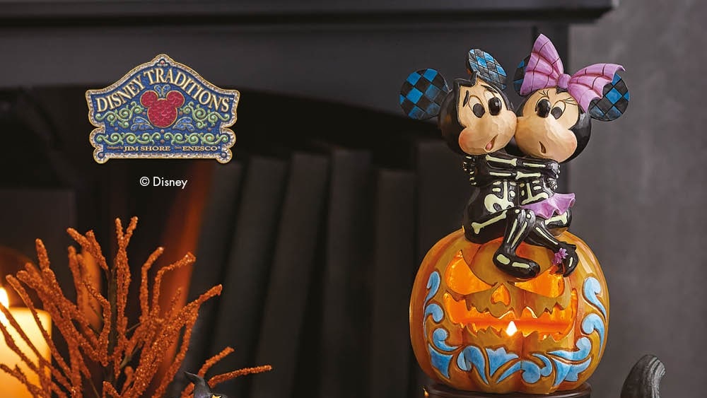 Halloween Disney Traditions and Villains figurines on seasonal shelf display