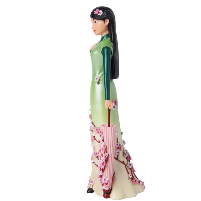 Back view of the Botanical Mulan Figurine – Disney Showcase by Enesco, featuring Mulan’s flowing outfit and delicate botanical accents.