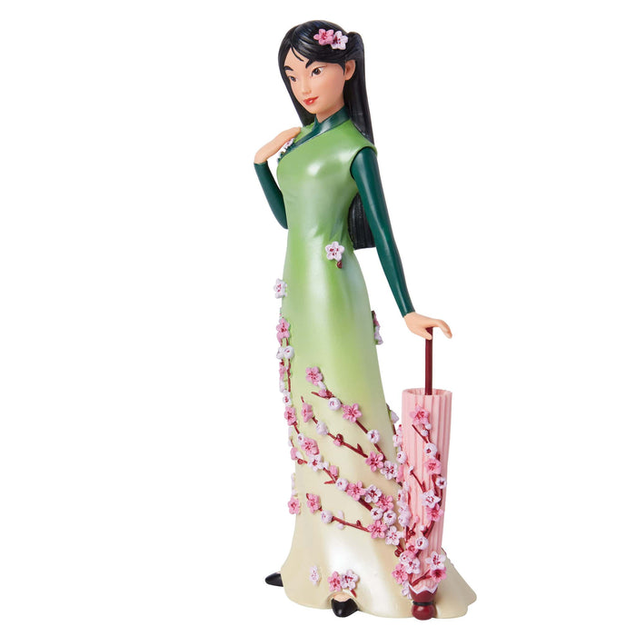 Side view of the Botanical Mulan Figurine – Disney Showcase by Enesco, showcasing intricate floral details and elegant color tones.