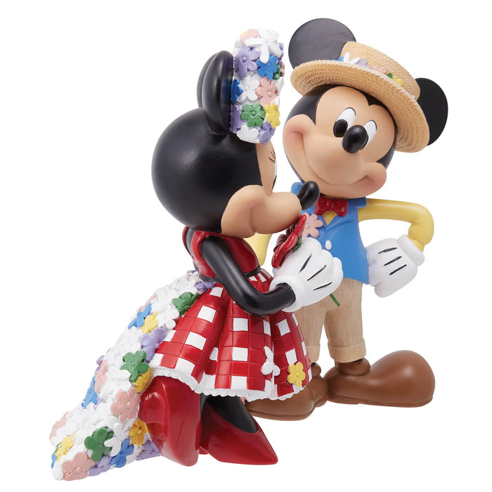 Side view of the Mickey & Minnie Botanical Figurine – Disney Showcase by Enesco, showcasing intricate floral details and romantic design.