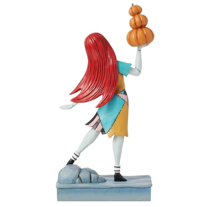 Back view of A Stack of Jacks (Sally with Pumpkins Figurine) – Jim Shore hand-painted Disney collectible with beautifully sculpted Halloween craftsmanship.