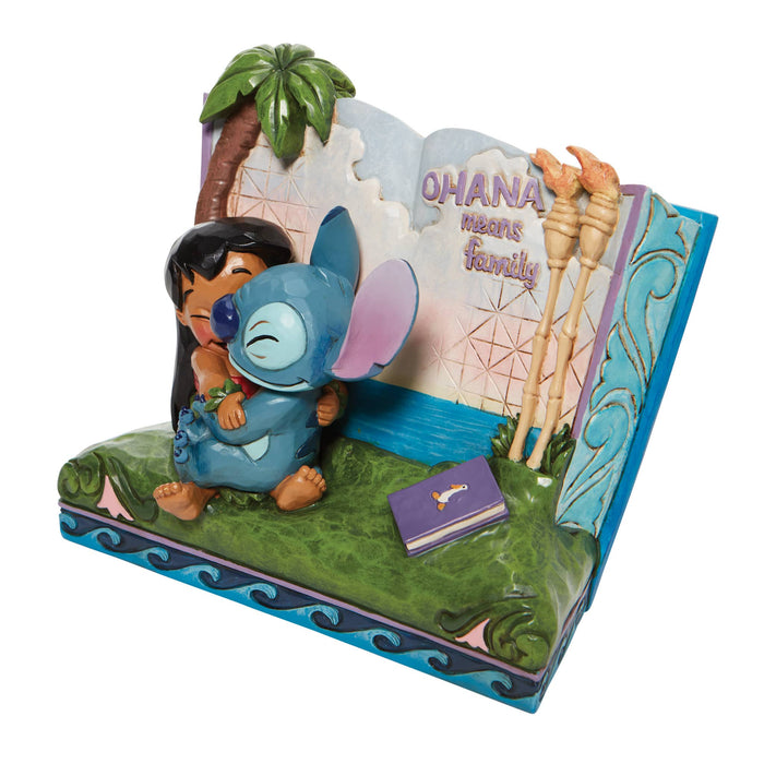 Side view of Lilo & Stitch Storybook Figurine – Enesco Disney Traditions by Jim Shore, featuring intricate folk-art details.
