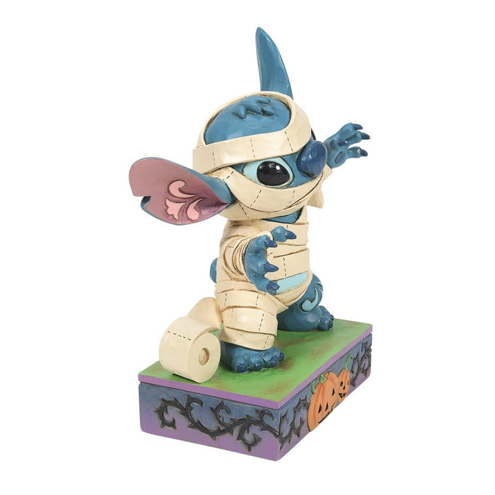 Side view of Mummy Stitch Figurine – Enesco Disney Traditions, showcasing folk-art patterns and spooky charm.