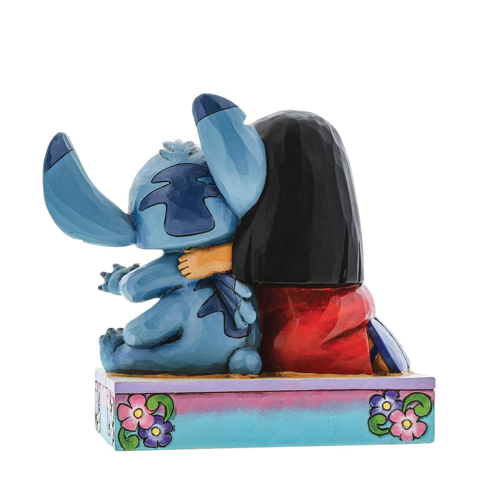 Back view of Ohana Means Family Lilo & Stitch Figurine – Jim Shore hand-painted Disney collectible with intricate sculpting.