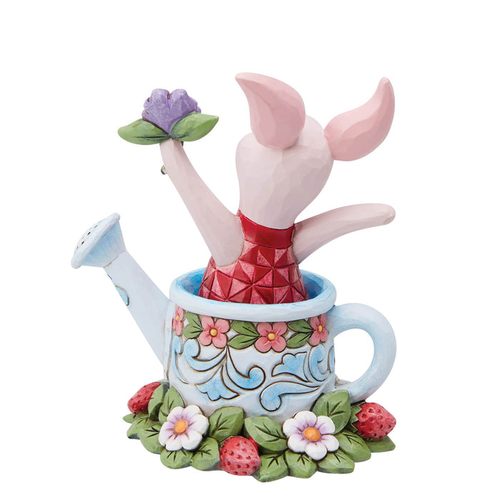 Back view of Piglet in a Watering Can Figurine – Jim Shore hand-painted Disney collectible from Winnie the Pooh.