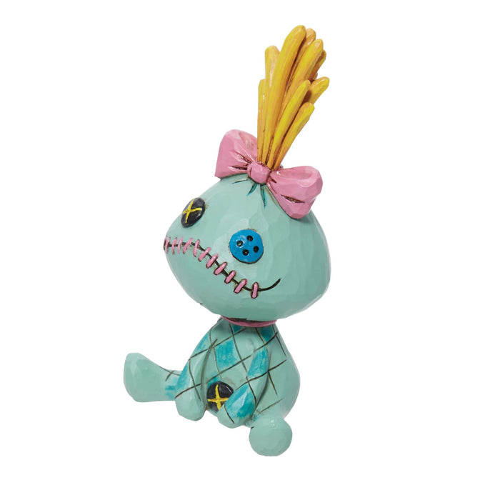 Side view of Scrump Mini Figurine – Enesco Disney Traditions by Jim Shore, featuring folk-art details.