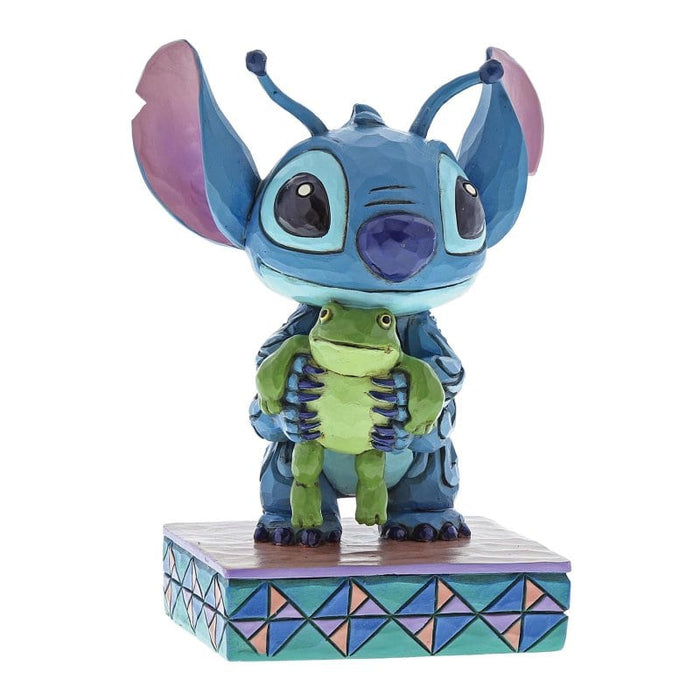 Side view of Strange Life-Forms (Stitch with Frog Figurine) – Enesco Disney Traditions by Jim Shore, showcasing intricate folk-art details.