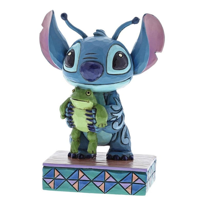 Strange Life-Forms (Stitch with Frog Figurine) – Enesco Disney Traditions by Jim Shore, hand-painted collectible featuring Stitch curiously looking at a frog.