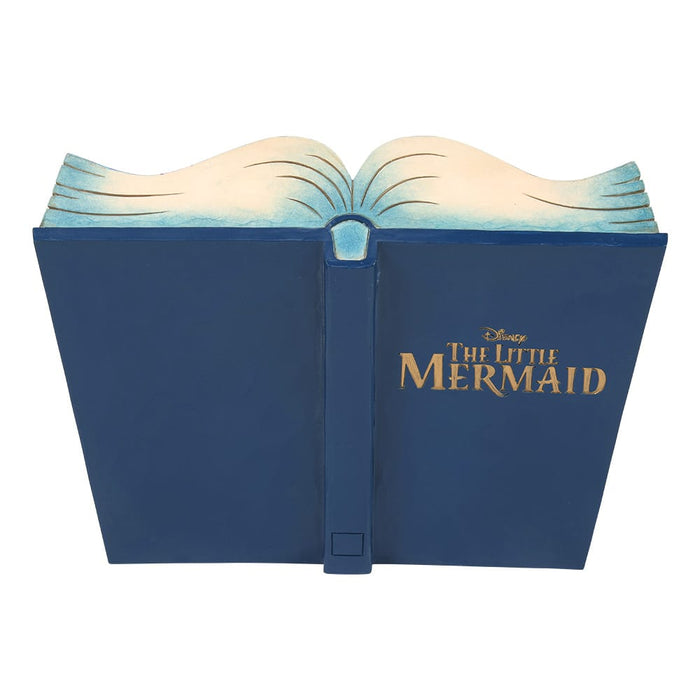 Back view of The Little Mermaid Storybook Figurine – Jim Shore Disney collectible sculpted as an open storybook scene.