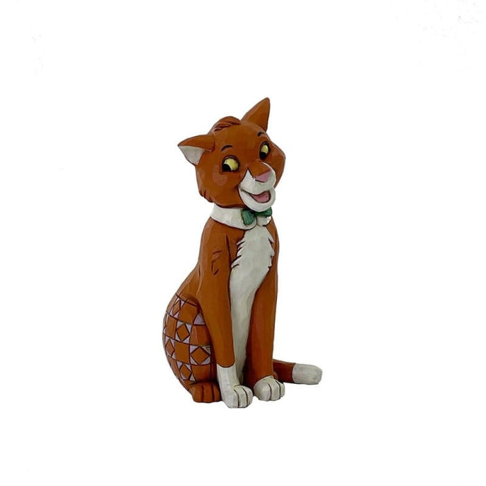 Side view of Thomas O'Malley Mini Figurine – Enesco Disney Traditions by Jim Shore, showcasing intricate folk-art details.