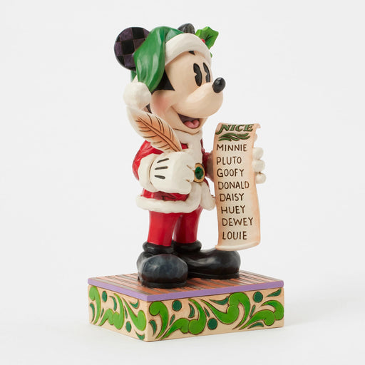 Twenty Years of Magic (Limited Edition Santa Mickey with List) – Enesco Disney Traditions by Jim Shore, hand-painted collectible featuring Santa Mickey Mouse checking his Christmas list.