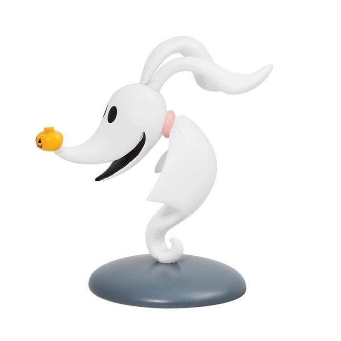 Side view of Zero Mini Figurine – floating ghost-dog design with pumpkin nose.