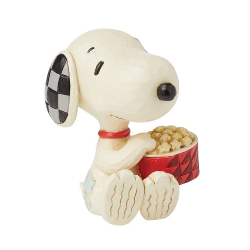 Side view of Snoopy Popcorn Mini Figurine – Jim Shore Peanuts mini collectible with striped popcorn tub.