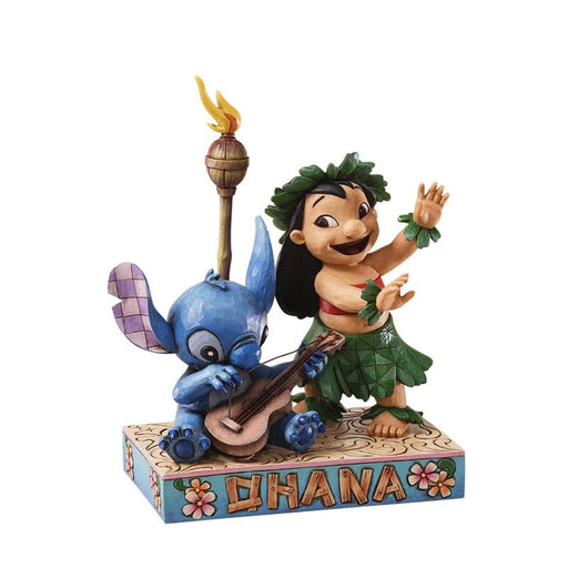 Lilo and Stitch Figurine – Enesco Disney Traditions by Jim Shore, hand-painted collectible featuring Lilo dancing and Stitch playing guitar.
