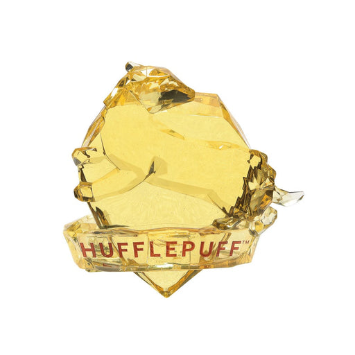 Hufflepuff Facet Figurine – Enesco Harry Potter Facets Collection, featuring a crystal-style crest of Hufflepuff House in yellow and black.  
