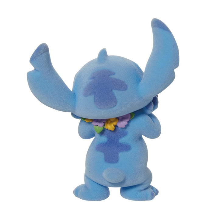Back view of Flocked Stitch Figurine – hand-painted sculpt with branded box.
