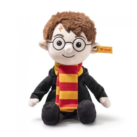 Harry Potter plush toy by Steiff wearing Gryffindor scarf and black wizard robe – 2025 licensed collectible.
